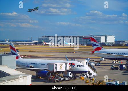 HEATHROW, ENGLAND -14 JUL 2022- View of an airplane from British Airways (BA) at London Heathrow Airport (LHR), the main airport in London. Stock Photo