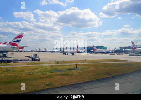 HEATHROW, ENGLAND -14 JUL 2022- View of an airplane from British Airways (BA) at London Heathrow Airport (LHR), the main airport in London. Stock Photo