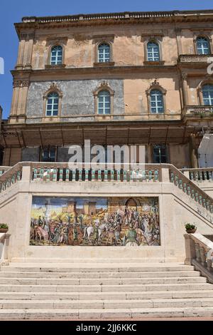 The historical mural painting on a staircase in a square, Caltagirone, Sicily, Italy, vertical Stock Photo