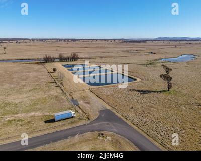 An aerial view of fish hatchery ponds in a field of a village of Deepwater, New South Wales,Australia Stock Photo