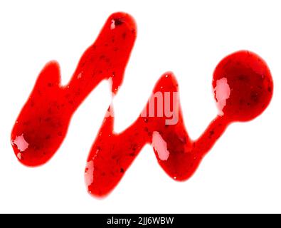 Strawberry jam drizzle isolated on white background. Splashes of berry confiture. Top view Stock Photo