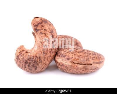 Cashew nuts in shell isolated on white background. Roasted and salted cashew nuts Stock Photo