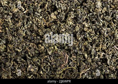 Dry gynostemma pentaphyllum leaf blackground. Jiaogulan or Miracle grass. Chinese herbal tea. Top view Stock Photo