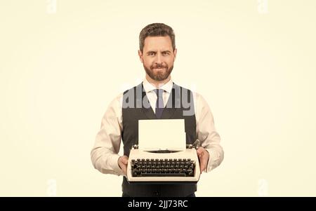man showing vintage typewriter isolated on white background, bookman Stock Photo