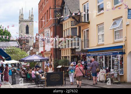 Tourists and visitors in Church Street, Windsor, Berkshire, UK, in summertime Stock Photo
