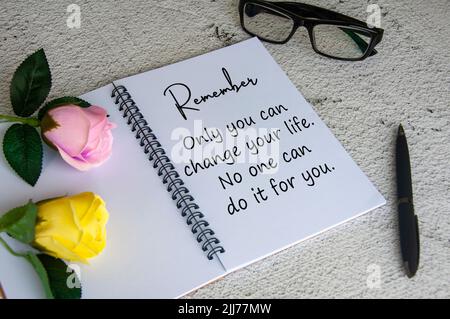 Life inspirational quote text on notepad - Only you can change your life. No one can do it for you. Inspirational concept Stock Photo
