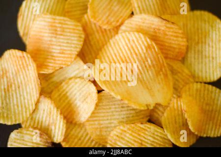 fast food ridged chips recipe fried potato slices Stock Photo