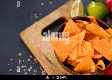 homemade fried tortilla nacho chips spicy food Stock Photo