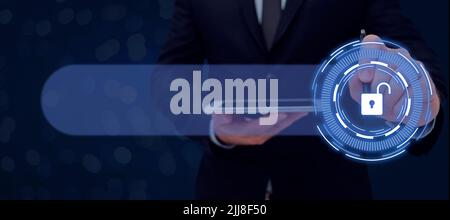 Man About To Touch New Glowing Technology Holding Tablet And Pen In Hands. Mans Looking Security Box Display Screen. Technology Drawing Digitally Stock Photo