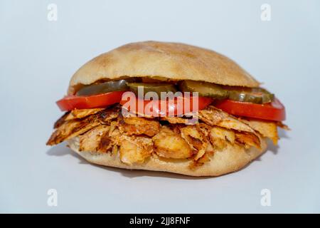 Döner chicken sandwich or Sandviç döner Isoläted on white background. Stock Photo