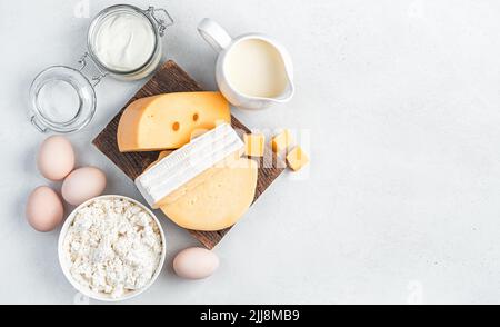 Fresh dairy products on a gray background. Stock Photo