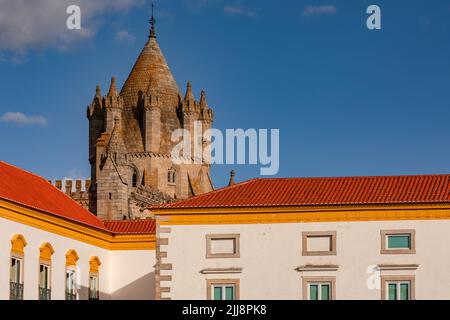 The historic Cathedral behind the Museum of Evora in the old town on a blue sky day, Evora, Portugal Stock Photo
