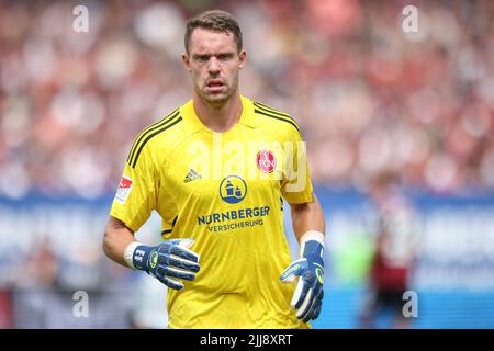 23 July 2022, Bavaria, Nuremberg: Soccer: 2nd Bundesliga, 1. FC Nuremberg - SpVgg Greuther Fürth, 2nd matchday at Max Morlock Stadium. Nuremberg goalkeeper Christian Mathenia. Photo: Daniel Karmann/dpa - IMPORTANT NOTE: In accordance with the requirements of the DFL Deutsche Fußball Liga and the DFB Deutscher Fußball-Bund, it is prohibited to use or have used photographs taken in the stadium and/or of the match in the form of sequence pictures and/or video-like photo series. Stock Photo