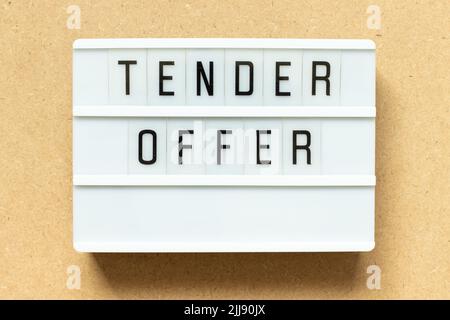 Lightbox with word tender offer on wood background Stock Photo
