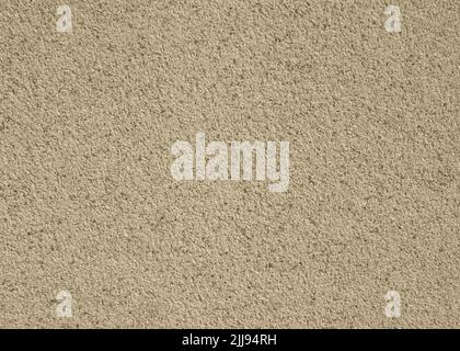 Abstract wall background. Beige plaster with mosaic pattern. Light surface with a chaotic loose pattern. Mosaic and granulated textured coating Stock Photo