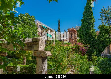 Street view in Plaka district of Athens at the Holy Church of Saint Catherine, Greece Stock Photo