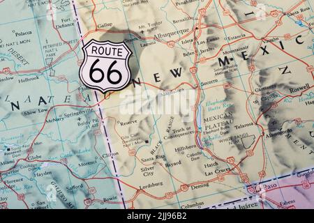 Still-Life Route 66 Shield Pin on a Highway map of Western States, 2022, USA Stock Photo