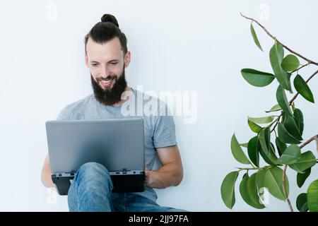 online business man remote work laptop freelance Stock Photo