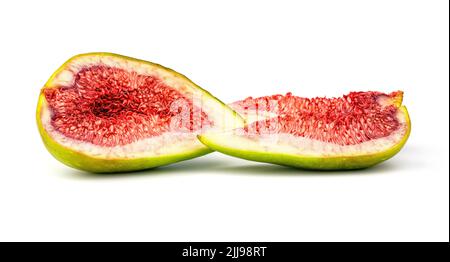Sliced fresh figs isolated on white background. Stock Photo