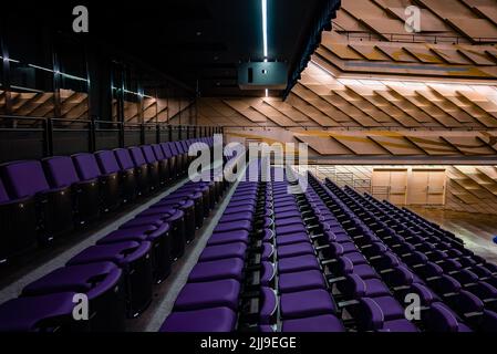Movie Theater with empty seats and projector. Stock Photo