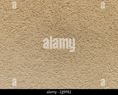 Perfect background shot for designers of a beautiful unique beige brown wall without cracks Stock Photo