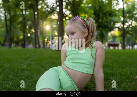 Little girl posing with a smile Stock Photo | Adobe Stock