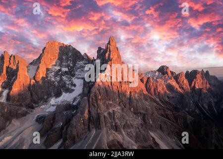 Pale di San Martino mountain group in sunset time. Hight mountains with glacier glowing by sunset light. San Martino di Castrozza, Dolomites, Trentino, Italy Stock Photo