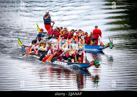 Two Dragon Boats racing along the River Mersey Two Dragon Boats racing along the River Mersey