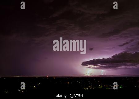 Dark sky during thunderstorm clouds lightning Stock Photo