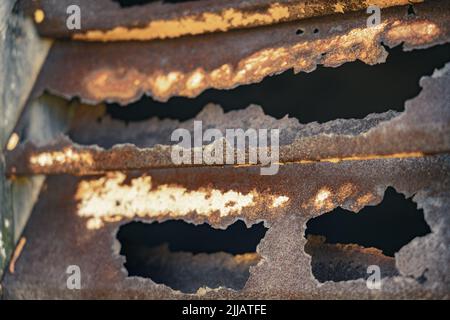 Old corroded rusted window shutters Stock Photo
