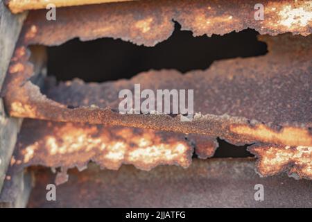 Old corroded rusted window shutters Stock Photo