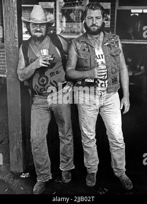 Bikers of the Fourth Reich Motor Cycle Club wearing Nazi insignia at the Steam Packet Hotel, in Tamworth during the Tamworth Country Music Festival in 1986 Stock Photo