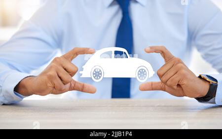 Moving in a new way. a businessman framing a car graphic. Stock Photo
