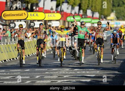 Paris, France July 24, 2022, Sepp Kuss of USA and Jumbo - Visma, Tiesj Benoot of Belgium and Jumbo - Visma, winner and yellow jersey Jonas Vingegaard of Denmark and Jumbo - Visma, winner of green jersey for best sprinter Wout van Aert of Belgium and Jumbo - Visma, Christophe Laporte of France and Jumbo - Visma celebrate while crossing the finish line of stage 21 of the Tour de France 2022, cycling race from Paris La Defense Arena to Paris Champs-Elysees (116 Km) on July 24, 2022 in Paris, France - Photo Jean Catuffe / DPPI Stock Photo