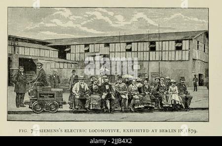 SIEMENS'S ELECTRIC LOCOMOTIVE, EXHIBHED AT BERLIN IN 1879 from the article ' DEVELOPMENT OF THE ELECTRIC LOCOMOTIVE ' By B. J. Arnold, M. Am. Inst. E. E. from The Engineering Magazine DEVOTED TO INDUSTRIAL PROGRESS Volume VII April to September, 1894 NEW YORK The Engineering Magazine Co Stock Photo