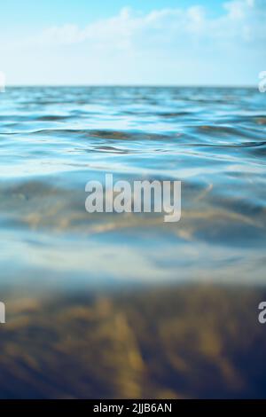 blue sky reflecting in water surface. High quality photo Stock Photo
