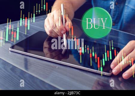 Businessman analyze sales data and graph economic growth. Planning and business strategy Analysis of forex trading Finance and banking. Stock Photo