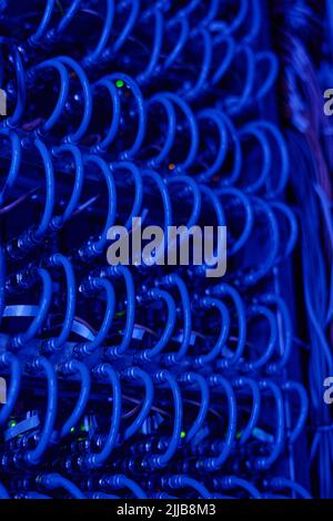 Close-up view on a patch panel with network cables in data center Stock Photo