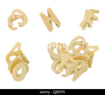 Stacks of wooden alphabets isolated on white Stock Photo