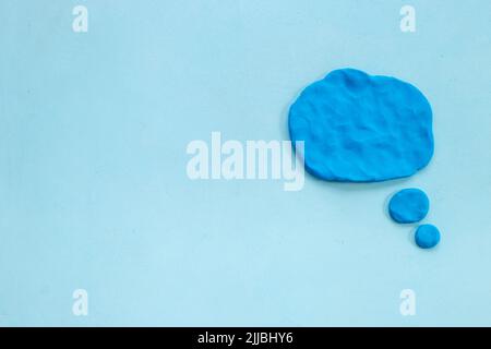 Commenication and messengers concept with text speech bubbles made of plasticine. Stock Photo