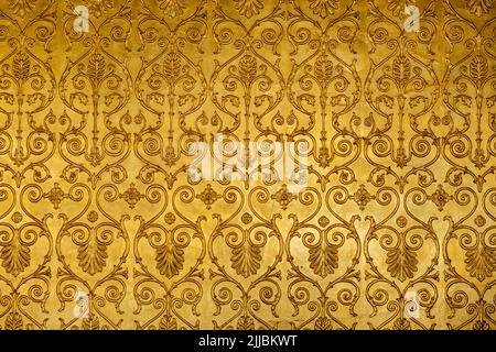 Gold ornamental pattern, wall background texture. Retro art decoration Stock Photo