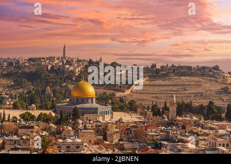 Sunset view of Jerusalem dominated by golden cupola of the Dome of the Rock Stock Photo