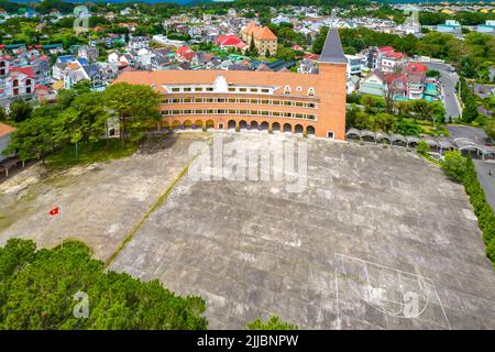 Aerial view Da Lat Pedagogical College, Vietnam in morning, with its unique arc-shaped French architecture, this place trains teachers to teach studen Stock Photo