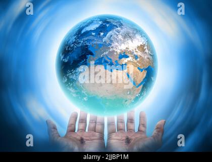 Hands of Christ saving the earth conceptual theme. Stock Photo