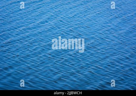 Blue tones water waves surface as background Stock Photo