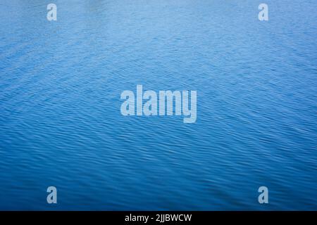 Blue tones water waves surface as background Stock Photo