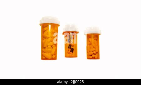 Three pill bottles isolated on a white background with clipping path Stock Photo