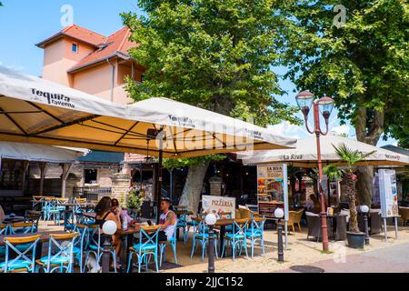 Restaurant terraces, Korzo, Petőfi sétány, main pedestrian street by the beach, Siofok, Hungary Stock Photo