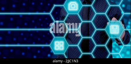 Businessman Pointing On Digital S In A Futuristic Pattern Design And Presenting Important Information. Executive Displaying Symbols And Crucial Data Stock Photo