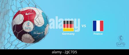 Guilherand-Granges, France - July 25, 2022. Soccer ball in net with official logo of UEFA Women's Cup Euro 2022 championship in England. Match : Germa Stock Photo